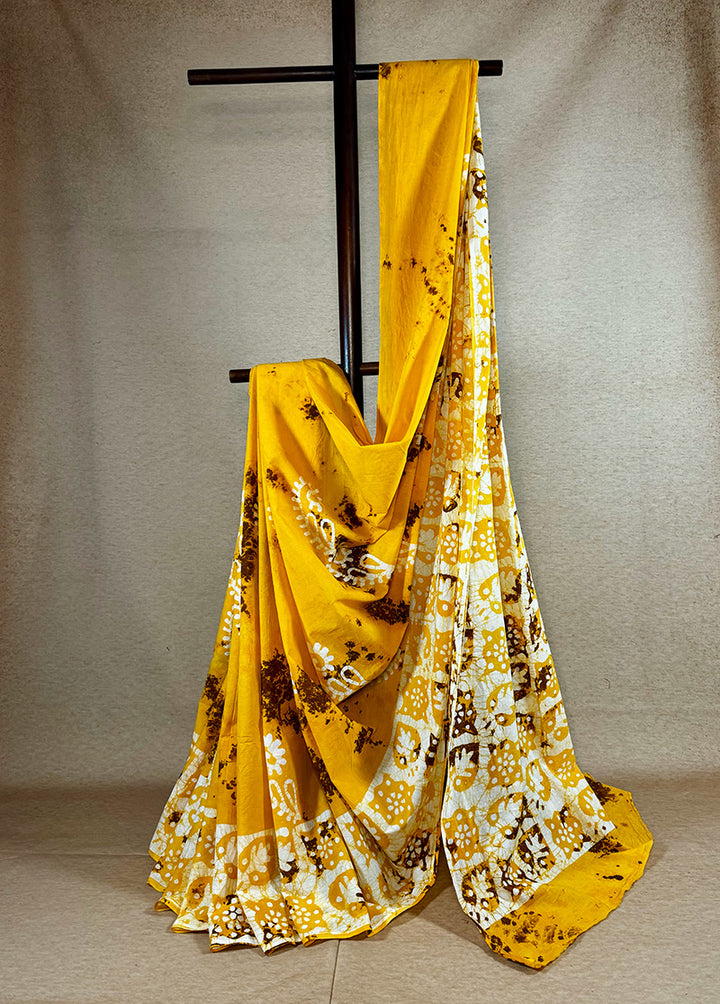 Hand dyed shibori cotton saree yellow with brown and white print