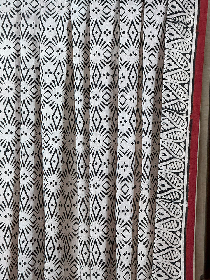 Hand block printed cotton saree brick red with offwhite and black print