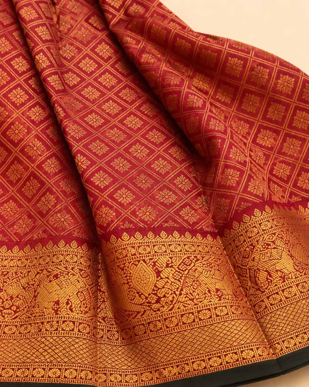 Maroon Checks Kanchivaram Saree With Elephant And Peacock Border