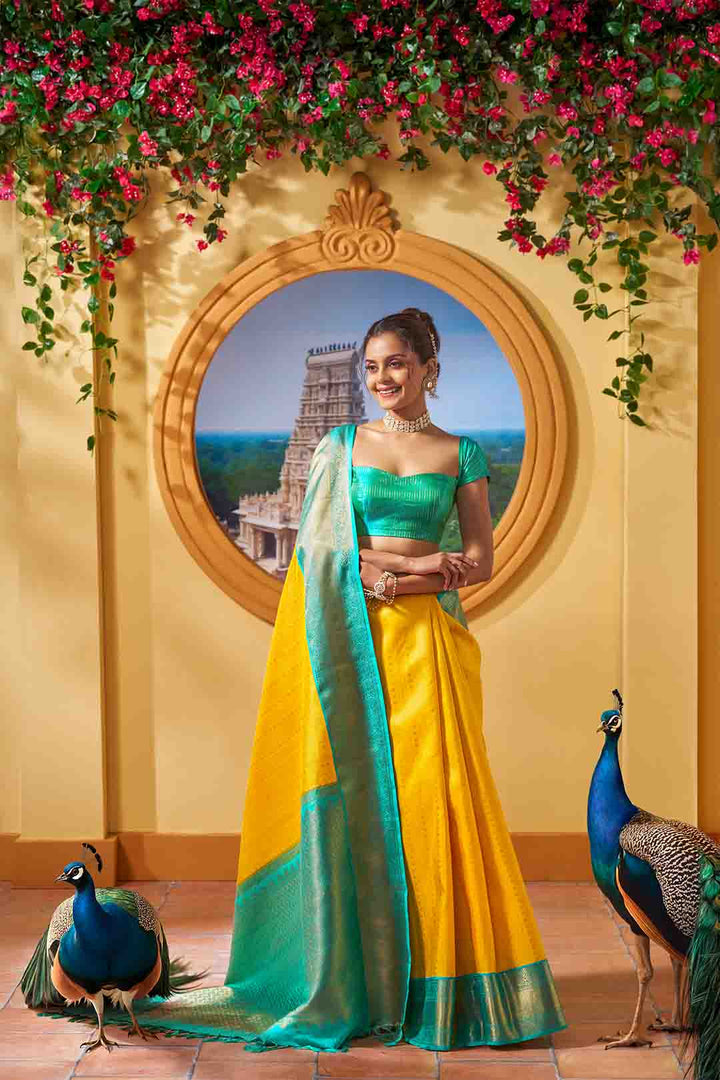 Turmeric Yellow Kanchivaram Saree With Rama Green Border