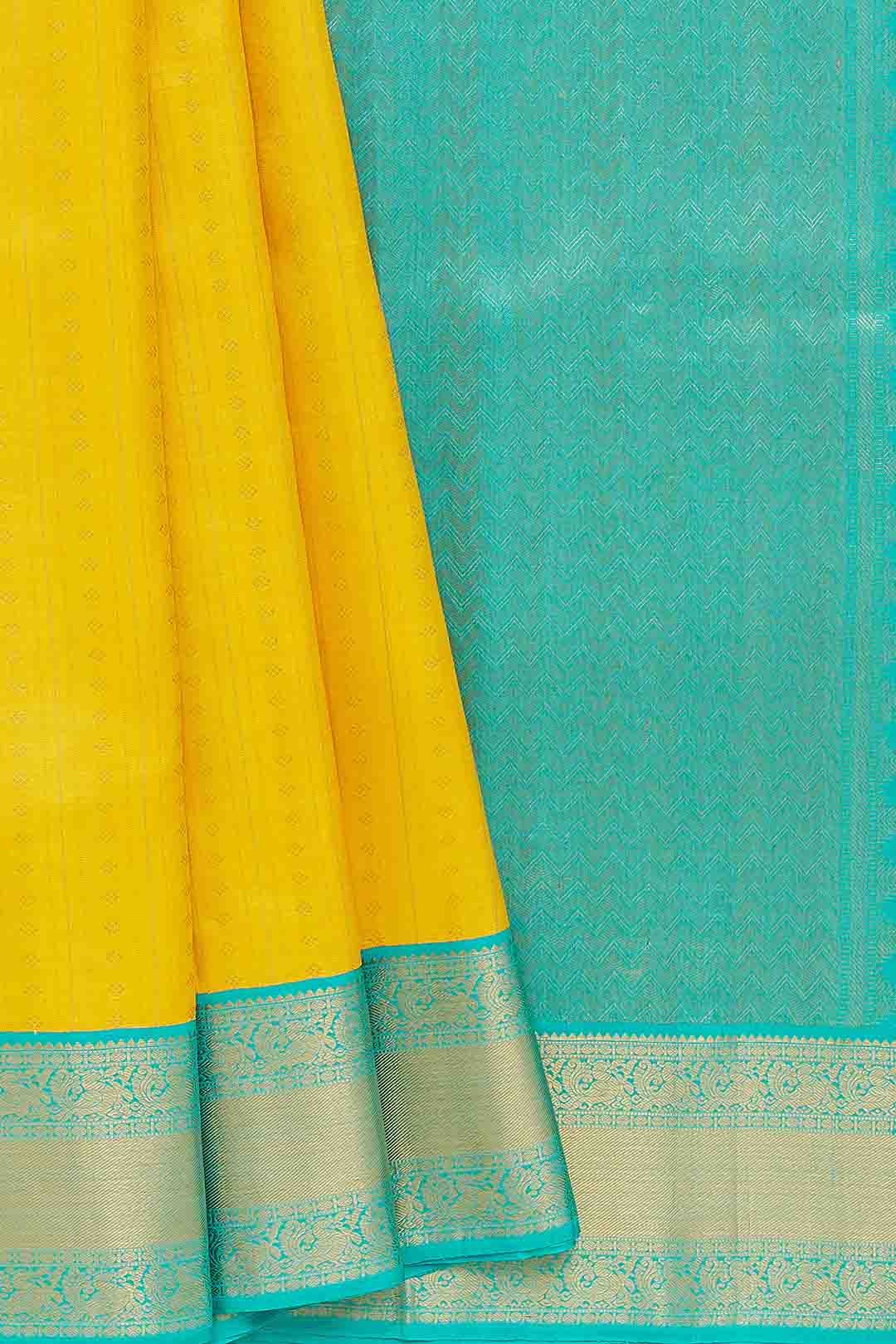 Turmeric Yellow Kanchivaram Saree With Rama Green Border