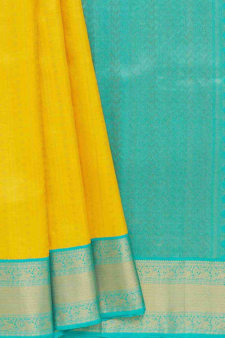 Turmeric Yellow Kanchivaram Saree With Rama Green Border