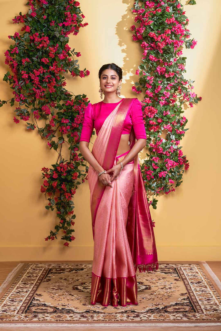 Peach Floral Kanchivaram Saree With Rani Pink Border