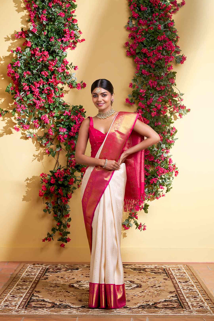 Beige Kanchivaram Saree With Pink Peacock Border