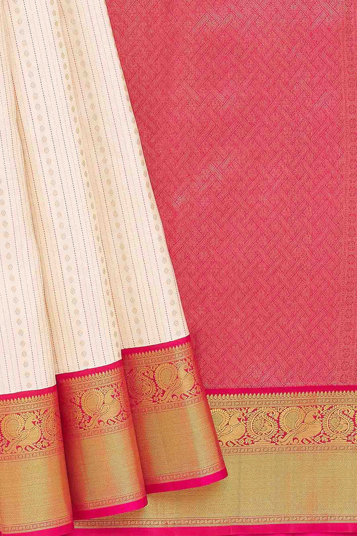 Beige Kanchivaram Saree With Pink Peacock Border